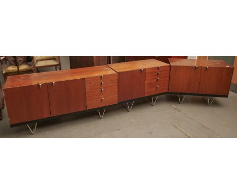 A Stag teak three section modular sideboard, 1970's, overall length approximately 320cm 