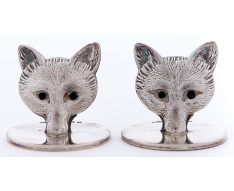 A pair of George V silver fox mask places stands, on disc base, 29mm h, by S Mordan &amp; Co Limited, London 1922, 2ozs 2dwts