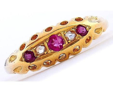 A ruby and diamond ring in gold marked 18ct, 2.3g, size L 