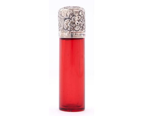 A Victorian silver mounted cylindrical ruby glass scent bottle, with embossed cap, 65mm h, maker's mark rubbed, London 1868 