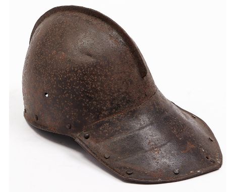 Armour. An English Civil War helmet, 17th c, the neck guard a single piece of sheet iron formed to resemble lames, 32cm l 