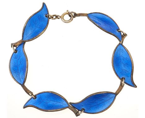 David Andersen. A Norwegian silver gilt and blue guilloche enamel bracelet of leaf shaped links, maker's mark 