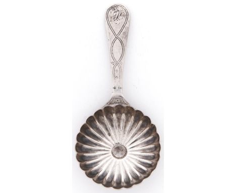 A George III silver caddy spoon, with round fluted bowl and engraved handle, initialled P, 77mm l, maker's mark poorly struck