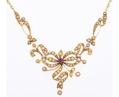 A ruby and split pearl necklace, in Art Nouveau style, in gold, fully articulated, 47cm l, marked k18, 23g 