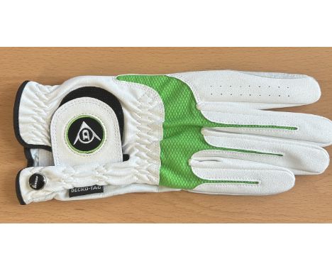 Tony Jacklin&nbsp;Signed Brand New Dunlop golf glove. Good Condition. All autographs come with a Certificate of Authenticity.