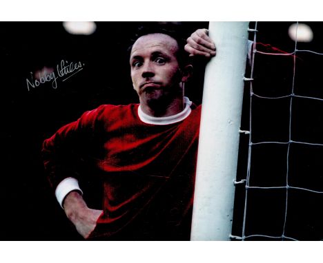 Nobby Stiles signed 12x8 colour photo pictured while playing for Manchester United. Good Condition. All autographs come with 