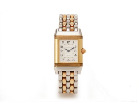JAEGER LECOULTRE LADIES REVERSO DUETTO BRACELET WATCH
Circa 2000
Stainless steel and gold, silvered dial with Arabic numerals