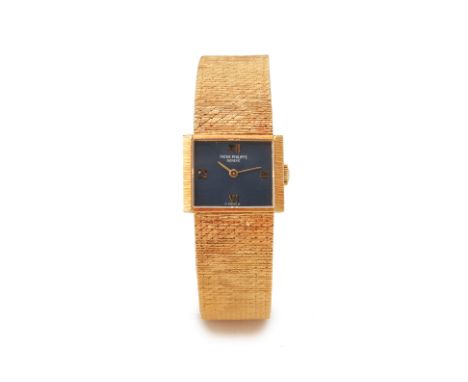 PATEK PHILIPPE LADIES VINTAGE GOLD BRACELET WATCH Manual wind movement, 18k gold square case and integral bracelet, blue dial