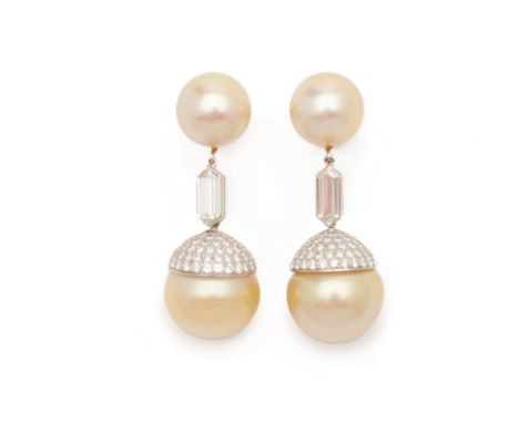 A PAIR OF PLATINUM, DIAMOND AND SOUTH SEA PEARL EARRINGS
South Sea pearls set as drop earrings and divided by a customised st