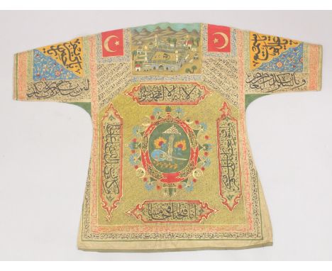 A 20TH CENTURY ISLAMIC OTTOMAN TALISMANIC HAND-PAINTED SHIRT / JAMA, the reverse painted with a panel of Mecca and emblem, th