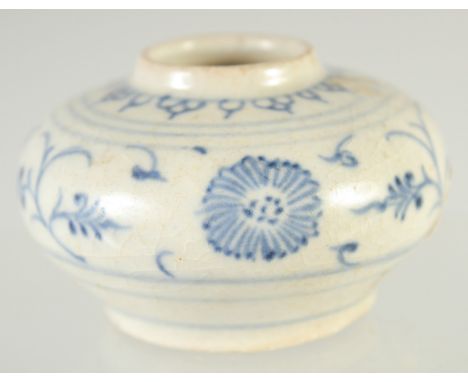 A SMALL CHINESE BLUE AND WHITE GLAZED POTTERY WATER POT, painted with foliate motifs, with applied sticker 'R &amp; G McPhers