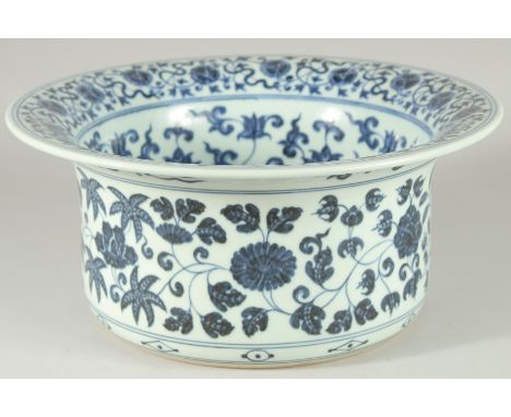 A CHINESE BLUE AND WHITE PORCELAIN WATER BASIN, the interior painted with auspicious symbols and floral motifs, 32cm diameter