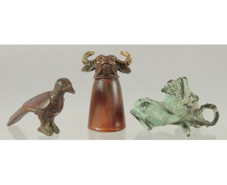THREE SMALL ANTIQUE BRONZE PIECES, one with rhino horn cup, (3).