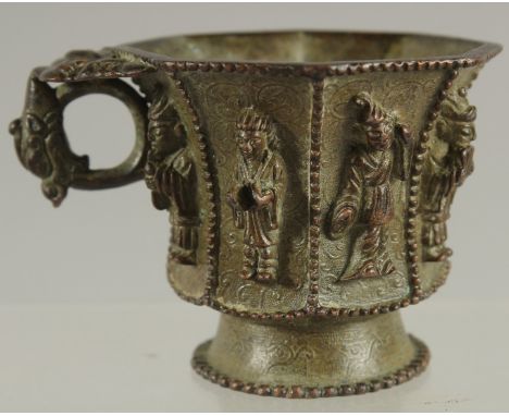 A CHINESE BRONZE CUP WITH RELIEF CAST FIGURES, mark to base possibly Da Tang Zhen Guan (true official ware of great Tang dyna