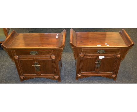 A pair of contemporary Oriental cupboards, one drawer above two drawers enclosing single shelf