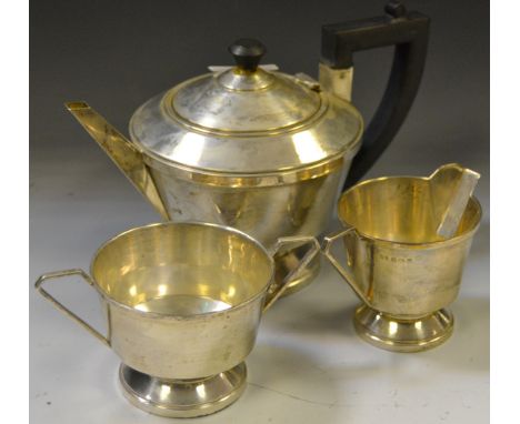 A silver Aaron Lufkin Dennison three piece tea service, comprising of a tea pot, cream jug and sucrier c.1905 620.8g gross 