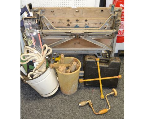 Tools - a WWII trench shovel, original case; workbench, various saws;  etc 