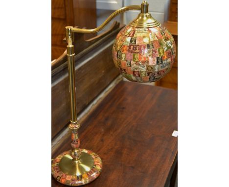 Interior Design - a bespoke brass domed lamp covered in lacquered stamps