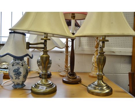 Lighting - a turned walnut lamp; three alabaster type table lamps; etc (8) 