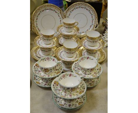 A Minton Haddon Hall part tea service comprising six teacups & saucers; a Victorian tea service decorated with gilded border 