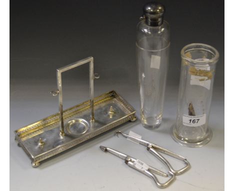 A silver dressing table tray by JD & S, hallmarked Sheffield; silver coloured metal mounted stirrup flask; a near pair of ste