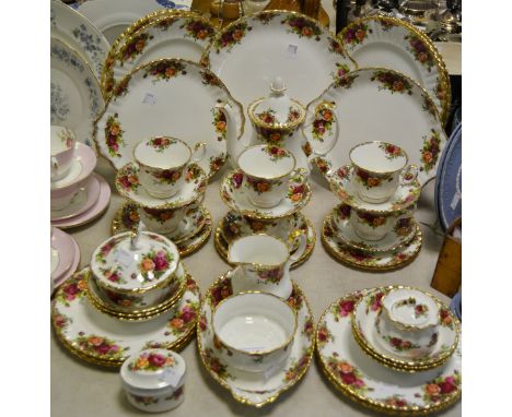 A Royal Albert Old Country Rose part dinner and tea service comprising serving dishes, dinner plates, coffee pot, cups & sauc