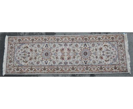 A vintage 20th century Persian manner runner carpet rug. The rug having cream ground, featuring hayat agaci style floral moti