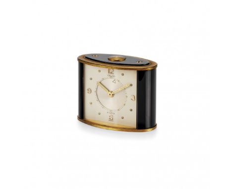 JAEGER-LECOULTRE MEMOVOX, ANNI '60 Cassa: firmata, in ottone dorato e anodizzato, sportello posteriore, pulsante in testa. Qu