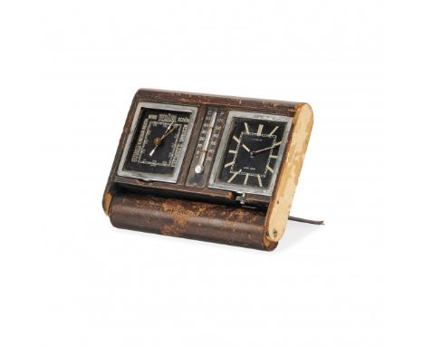 JAEGER-LECOULTRE FIRMATO GÜBELIN CON STAZIONE METEO, ANNI '50 Cassa: rivestita in pelle, metallo cromato, al centro ampolla a