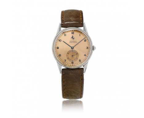 MOVADO PERSONALIZZATO EBERHARD E STEMMA FERRARI, ANNI '50 Cassa: firmata, n. 087586, tre corpi in acciaio, fondello a scatto.