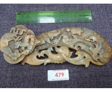 A Chinese jade carved ornamental carved plaque