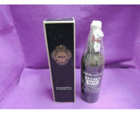 A bottle of Krohn's 1978 vintage port in card box