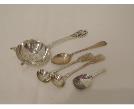 A silver tea strainer having decorative piercing to bowl and reticulated terminal, Sheffield 1955, Viners Ltd, two Victorian 