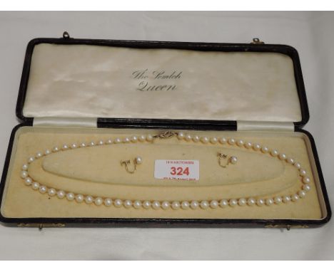 A string of cultured pearls of even form with 9ct gold clasp,  approx 20' and a pair of 9ct gold screw back pearl earrings