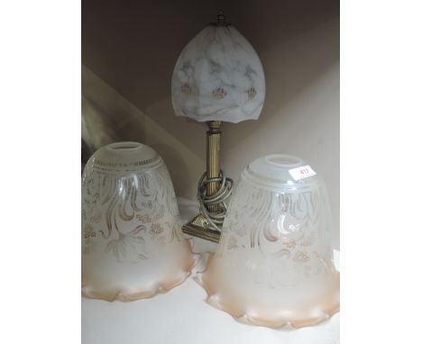 An early 20th century brass table lamp having 1920's mottled glass shade and a pair of late 20th century Victorian style glas