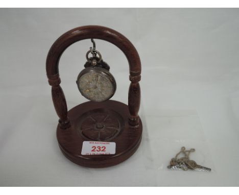 A Victorian silver key wound pocket watch having Roman numeral dial to gilt decorated silvered face in an engine turned case,