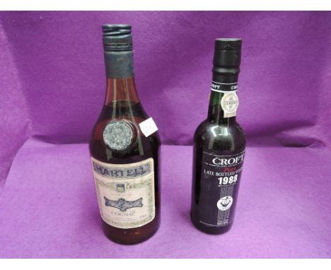 A bottle of VS Martell cognac 24fl ozs 70% proof and a half bottle of 1988 Croft port
