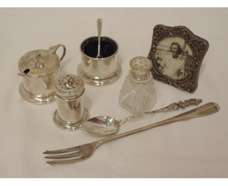 A small selection of HM silver and white metal including cruet set, small photograph frame, pickle fork etc