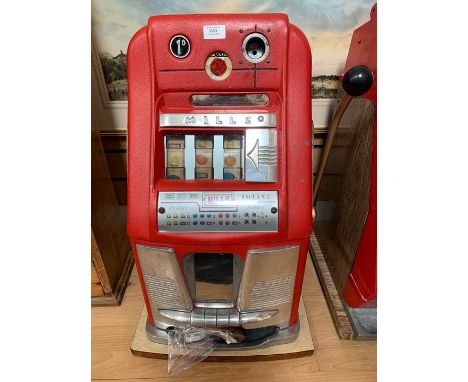 A Mills HI-Top Slot Machine, one arm bandit, 1d play, with hood and back door, working order, measuring approx. 17" x 27" x 1