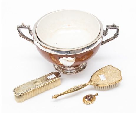 An Edwardian carved elm and silver plate mounted fruit bowl, with ceramic insert together with two silver gilt plated brushes