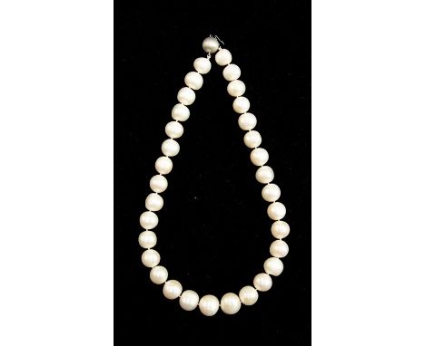A cultured pearl necklace, white pearls approx 12mm, length approx 17'', on a 9ct white gold ball clasp, strung plainConditio