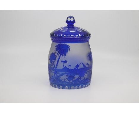 A Bohemian blue flashed cameo glass biscuit jar and cover, early 20th Century, of barrel form with facet cut finial and cover