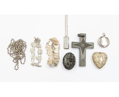 A collection of silver jewellery to include a silver chain, silver ingot and chain, silver hair locket, along with plated Vic