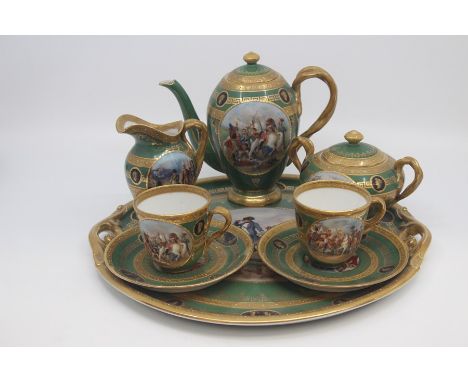 A Vienna style Cabaret coffee set of Napoleonic interest, early 20th Century, decorated with scenes of Napoleonic campaigns a