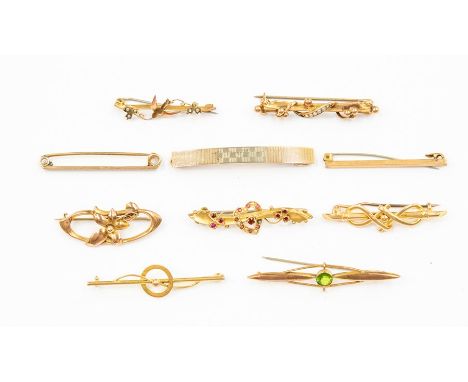 A collection of nine Edwardian 9ct gold brooches, to include stone set versions set with garnet and spinel, seed pearls and p