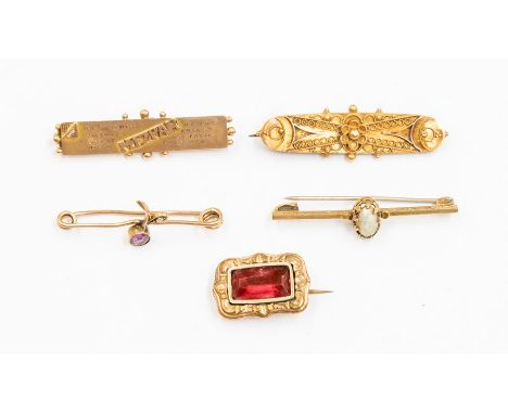 A collection of antique brooches to include a late Georgian early Victorian mourning brooch, unmarked yellow metal set with p