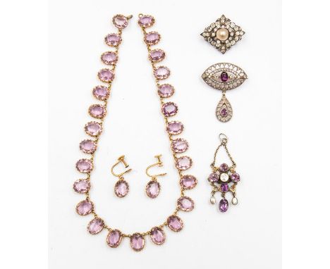 A collection of antique paste set jewellery to include a silver gilt brooch with dropper set with purple and white paste ston