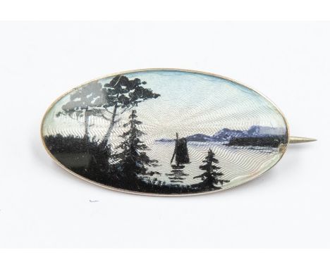 A Norwegian silver gilt and enamel brooch by Aksel Holmsen, oval form depicting a silhouette of a river boat scene, length ap