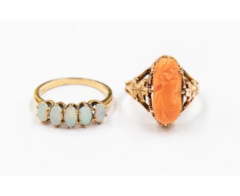 An opal and 14k gold ring, size l1/2, total gross weight approx. 2.1gm along with a carved coral and 14ct rose  gold ring, si