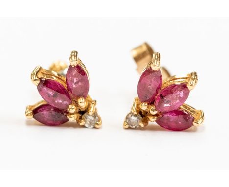 A pair of ruby and diamond 9ct gold stud earrings, comprising a fan of three marquise cut rubies, total ruby weight approx. 1